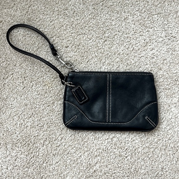 Coach Handbags - Coach Black Leather Wristlet with Contrast Stitching